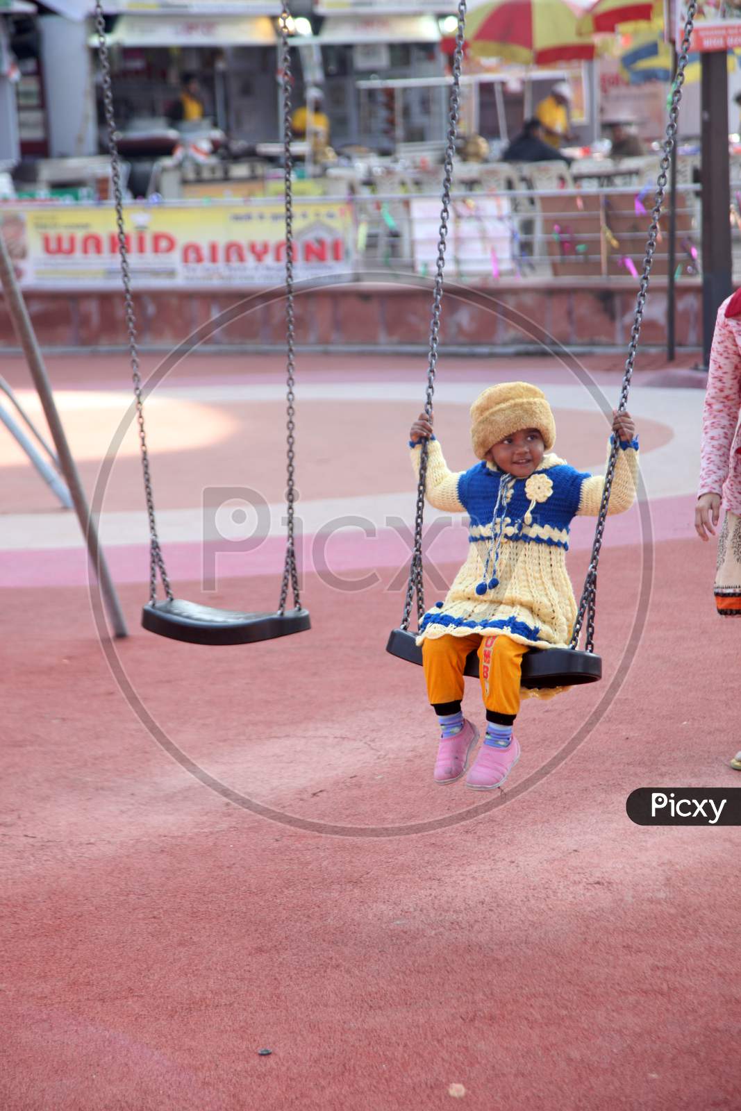 Portrait of an Indian Kid on Swing