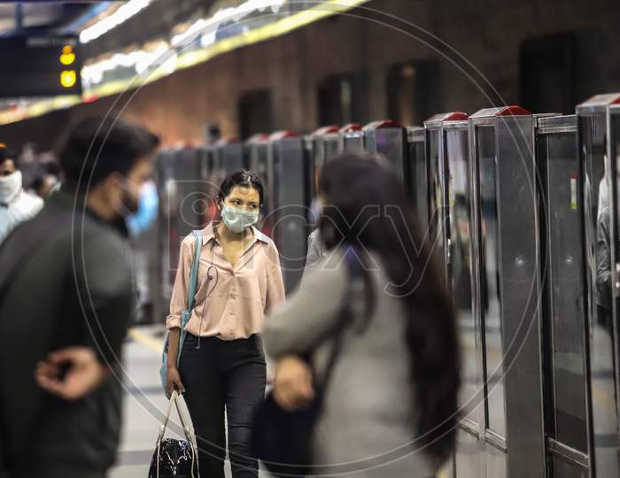 People Wearing Face Mask As A Preventive Measure Against The Covid-19 Novel Coronavirus  In New Delhi On March 13, 2020.
