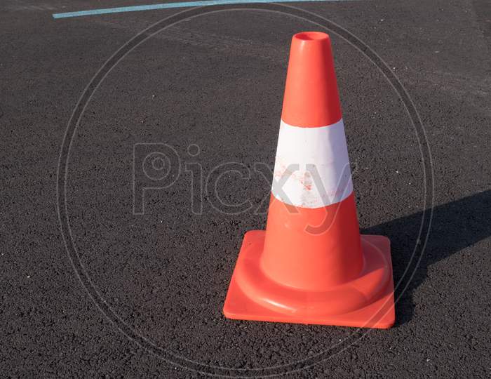 Traffic Cone With Shadow On Asphalt