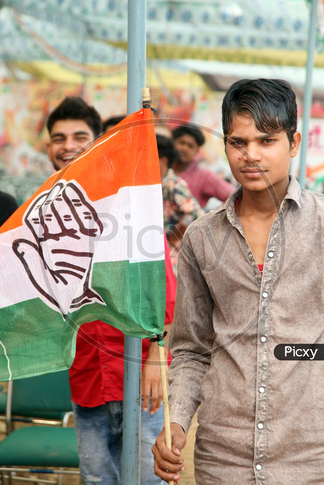 A Young Indian Man with Congress Party Flag