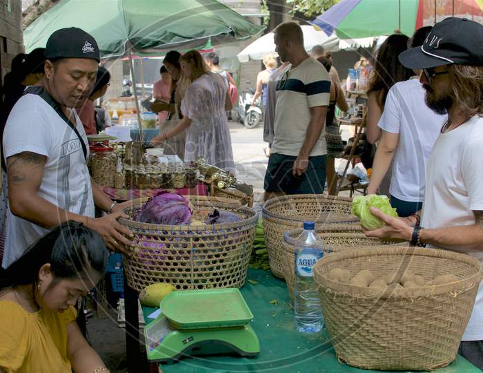 Vendors And Costumers At Organic Food Market