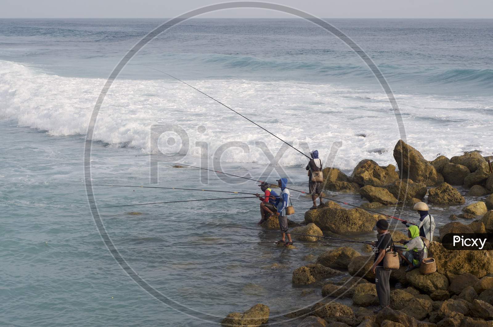 Typical Balinese Fishermen At Melasti Beach