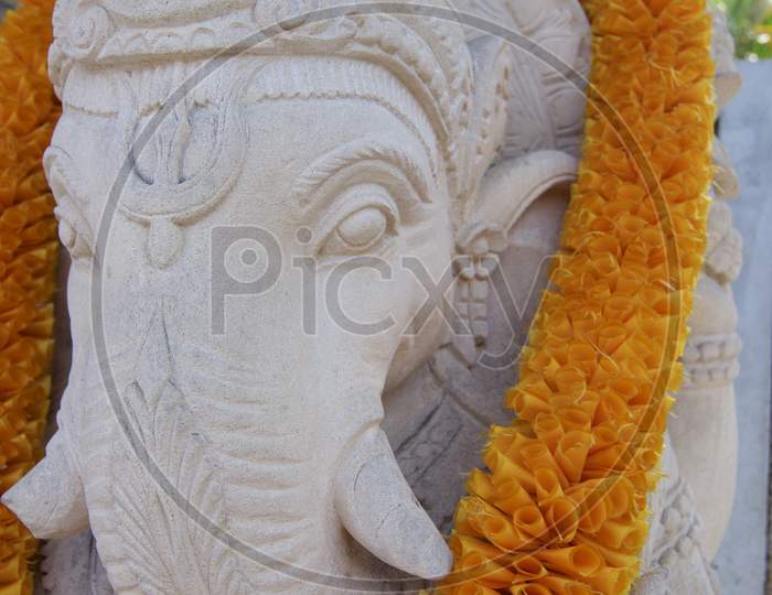 White Ganesha Stone Statue