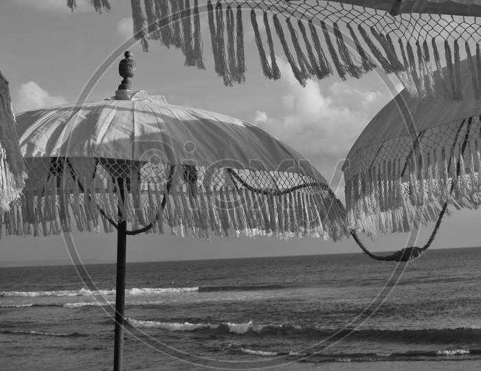 Black And White Picture Of Balinese Sun Umbrellas