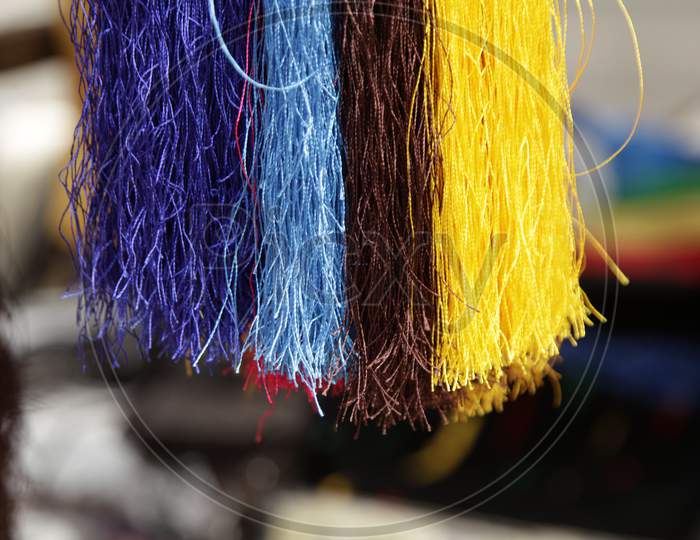Selective focus on Coloured Cloth threads