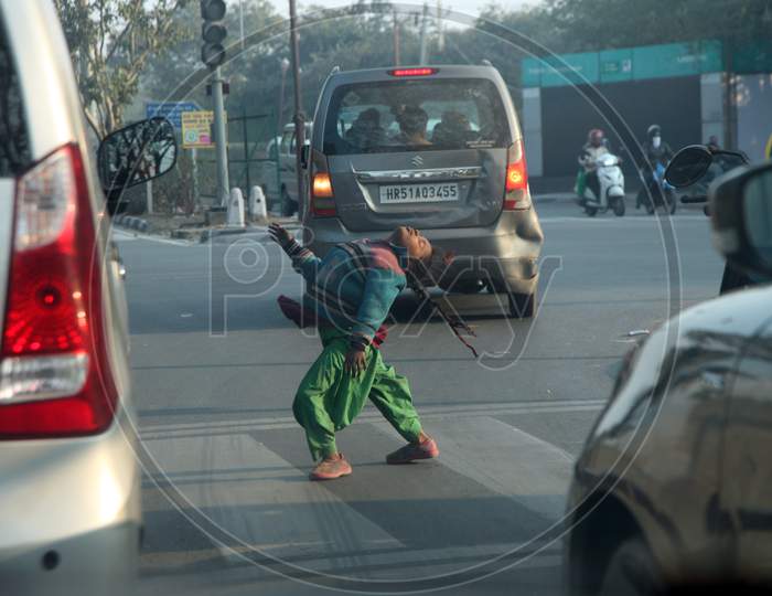 A Rural Kid crossing the road