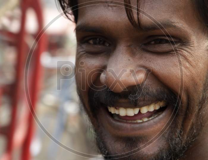 Portrait of a Young Indian Man with Smiling Face