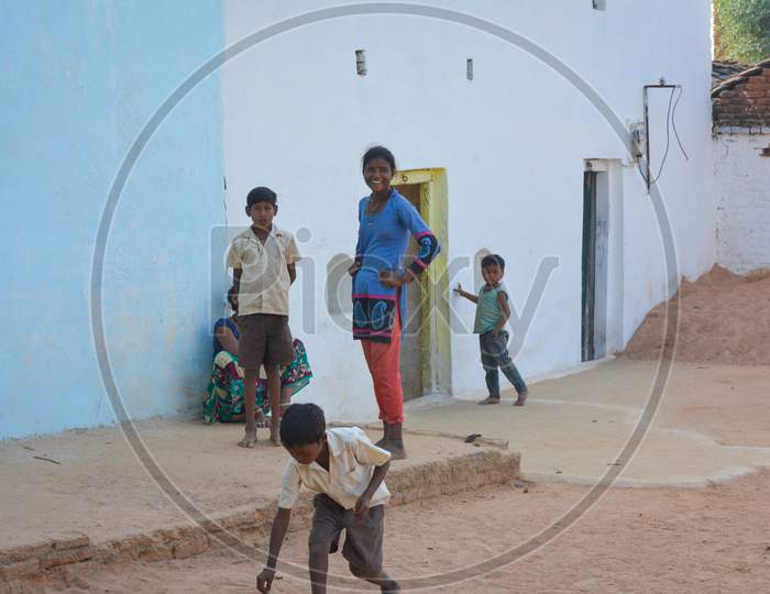 TIKAMGARH, MADHYA PRADESH, INDIA - NOVEMBER 15, 2019: Unidentified indian children looking curious into the camera.