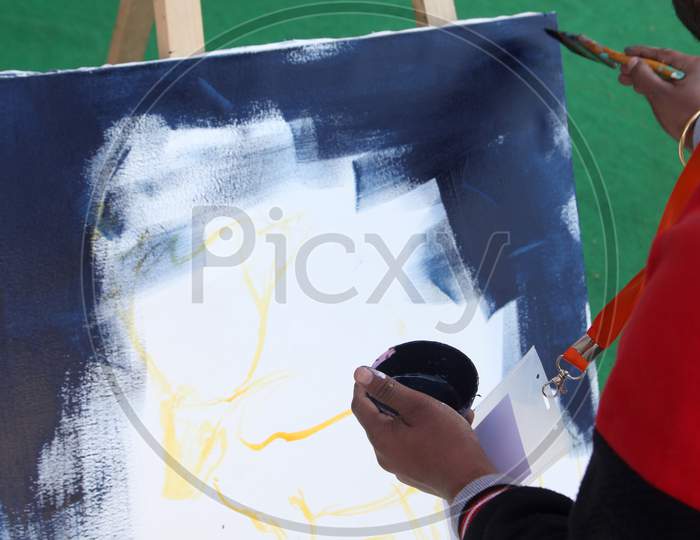 Close up shot of person doing a painting