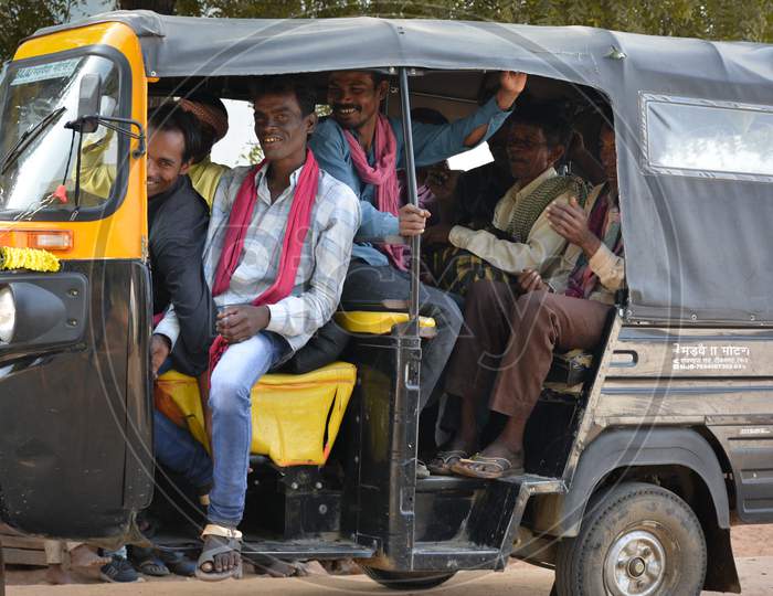 TIKAMGARH, MADHYA PRADESH, INDIA - NOVEMBER 12, 2019: Indian village people sitting together in auto rickshaw.