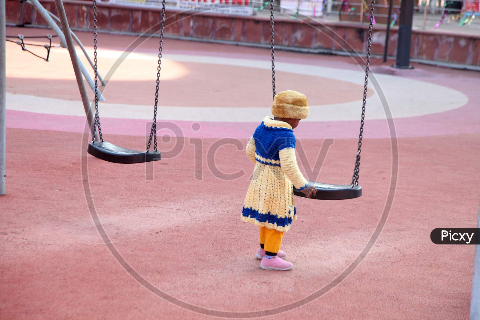 Portrait of an Indian Kid with a Swing