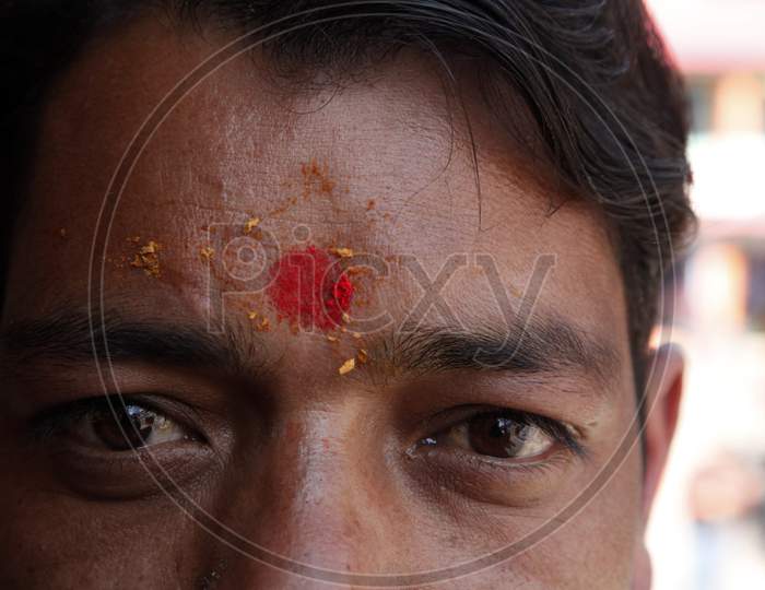 Close up Face shot of a Young Indian Man
