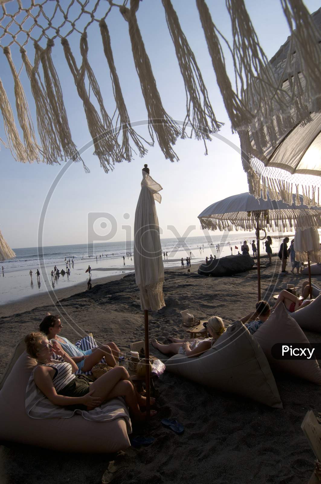 Tourists Relaxing At Echo Beach In Canggu