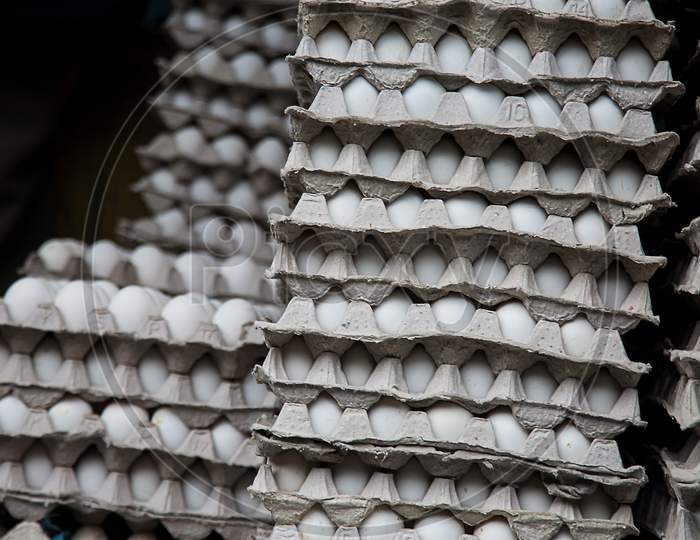 Fresh Farm White Eggs Stacked In Trays For Wholesale At The Supermarket, Ready To Shipping - Image