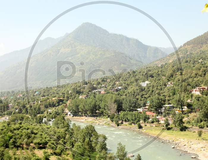 Mountains of Himachal Pradesh with Water flow in the Foreground