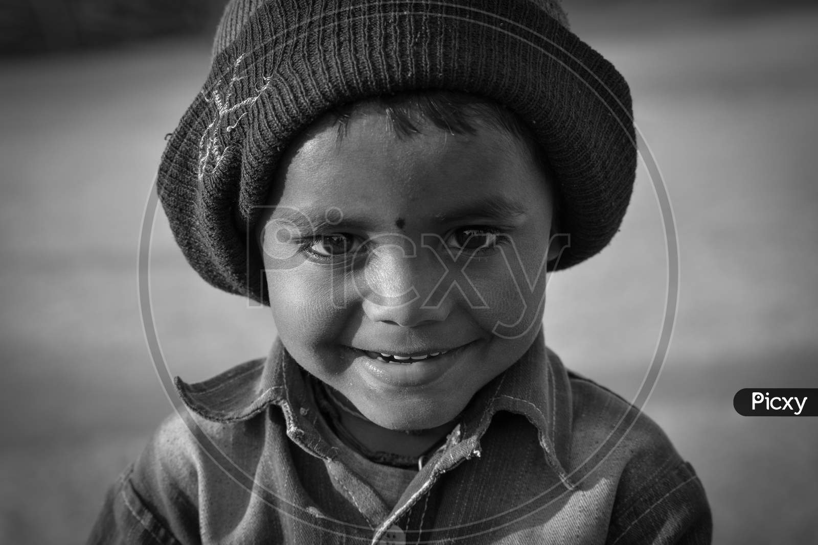 TIKAMGARH, MADHYA PRADESH, INDIA - FEBRUARY 11, 2020: Portrait of a little boy in black and white.