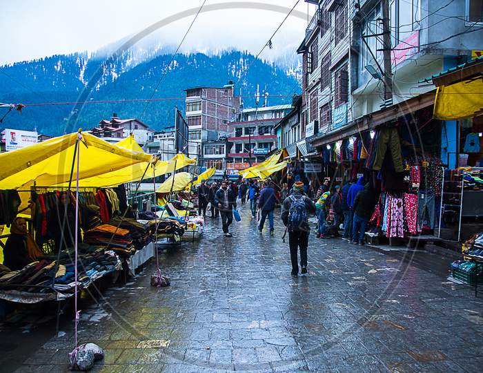 Manali , Himachal Pradsh, India - January 21, 2019 : People Enjoying Street Market Near Mall Road, Manali. Clothes Shop Selling A Winter Traditional Handmade Clothes. Popular Export Product - Image