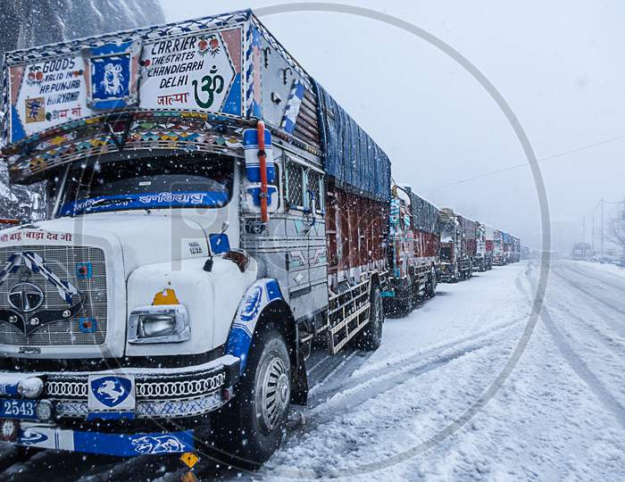 Manali, India - Jan 22, 2019: Trucks Parked On Roadside On Winter Snowy Day. - Image