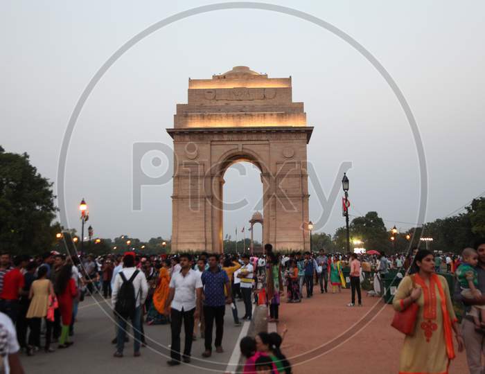 India Gate in New Delhi with Visitors in the Foreground