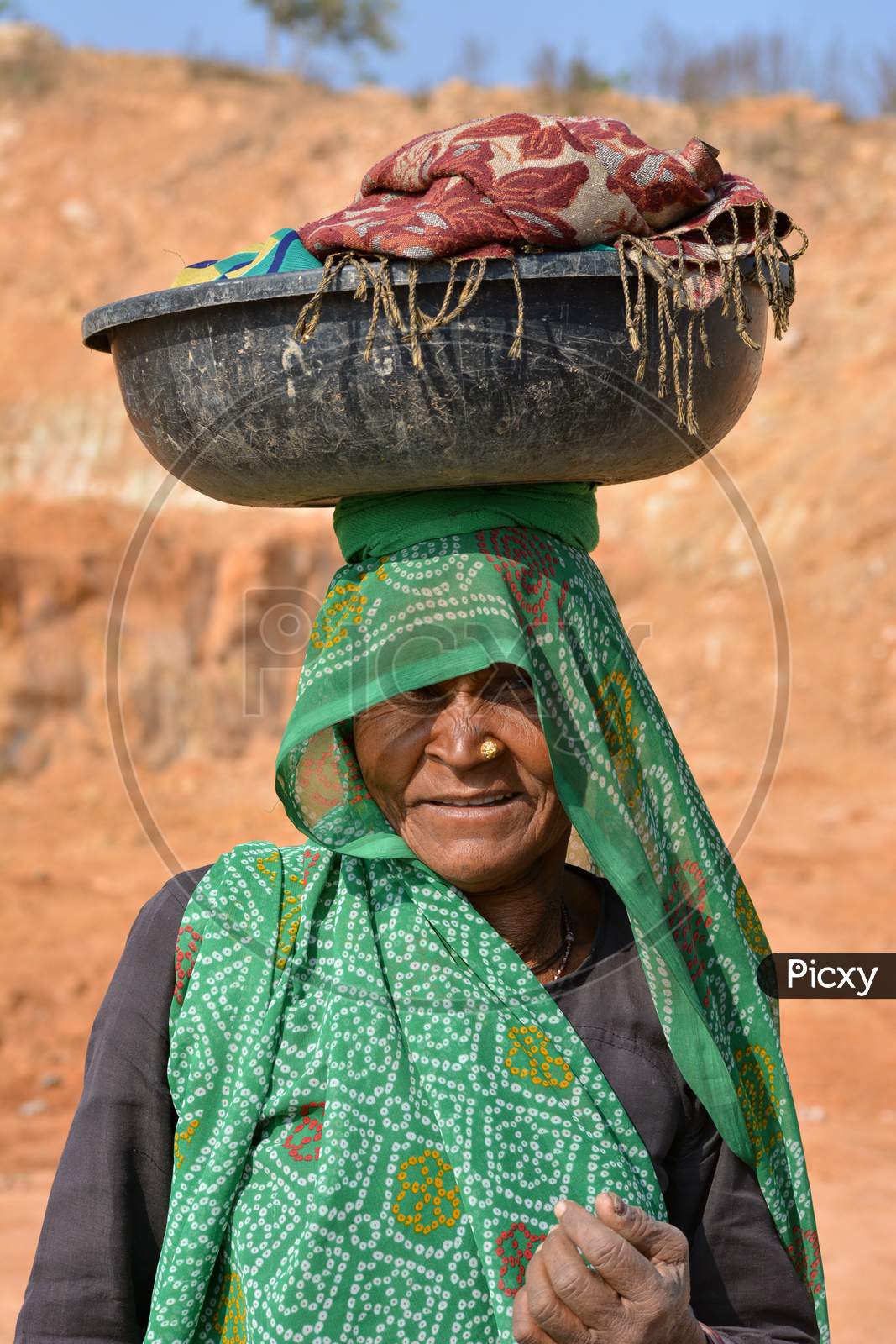 TIKAMGARH, MADHYA PRADESH, INDIA - FEBRUARY 09, 2020: A portrait of old unidentified indian woman at her village, An Indian rural scene.