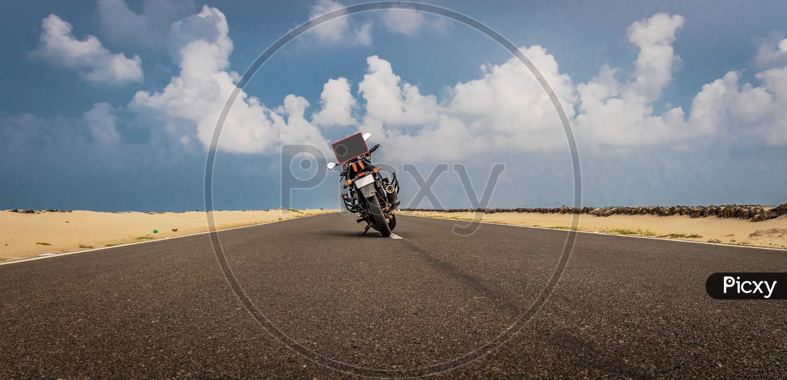 Motorcycle On Road With Sky And Ridding Love Message