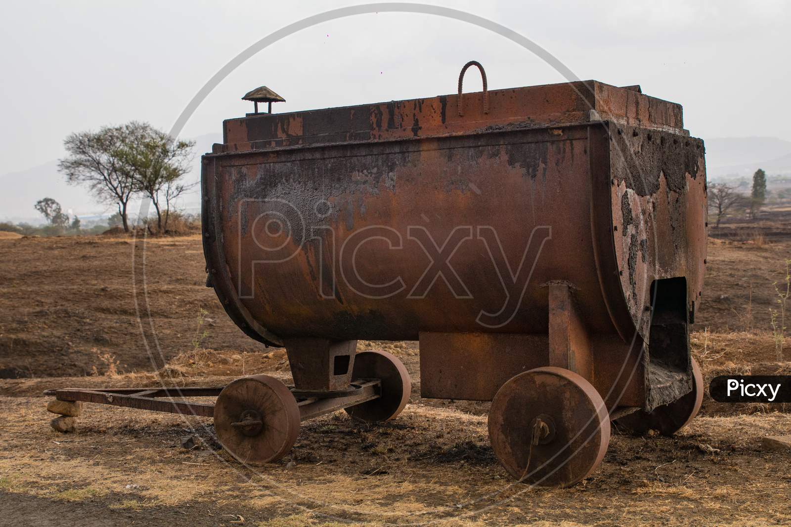 Side View Of A Mobile Tar Or Bitumen Melting Furnace Used In Road Construction