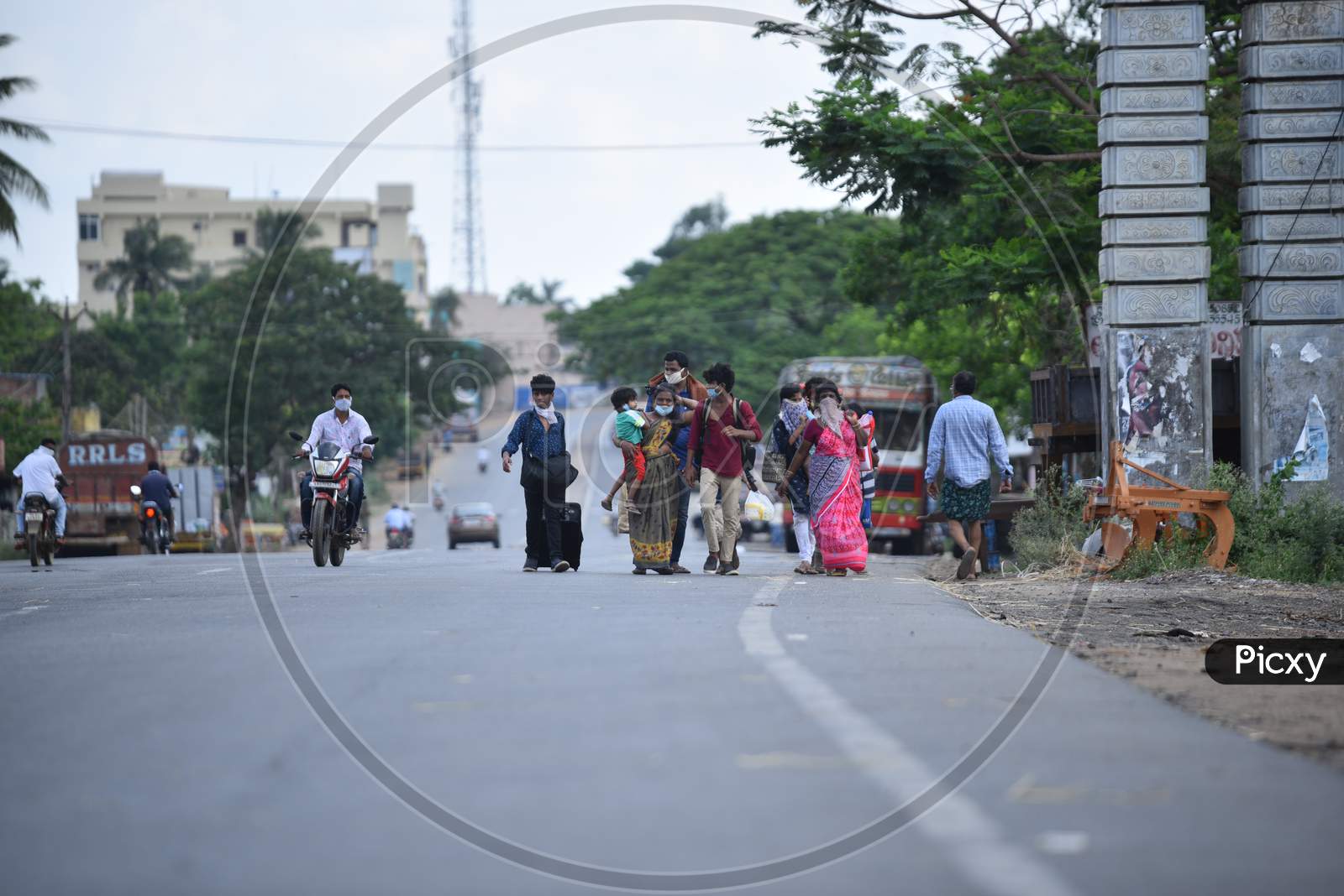A Migrant Family walks towards Telangana-Andhra Border in Aswaraopet, May 12, 2020 during an extended lockdown amid coronavirus pandemic.