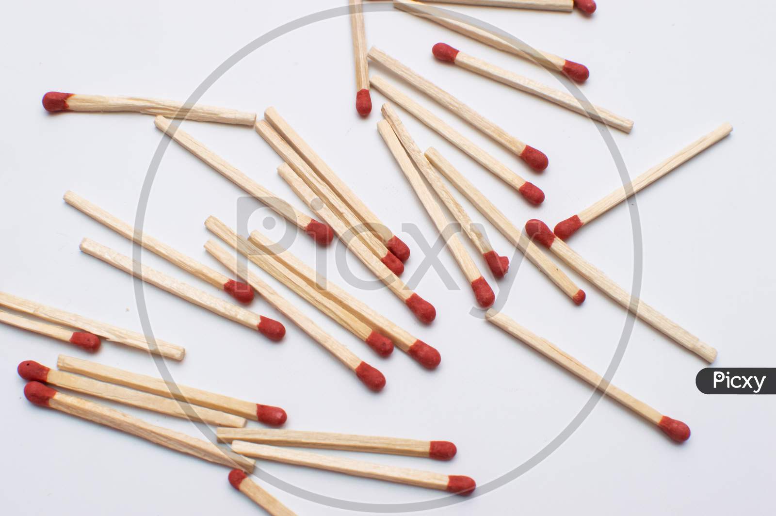 Matchsticks on a white background with spaces in between