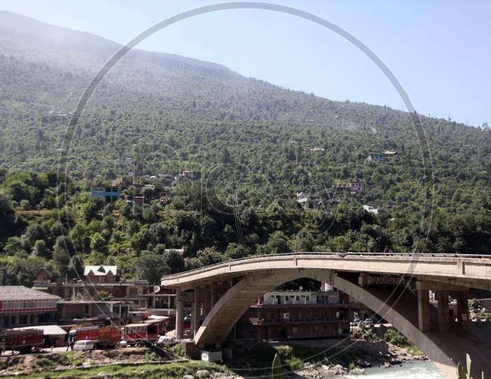 Mountains of Himachal Pradesh with a Bridge in the Foreground