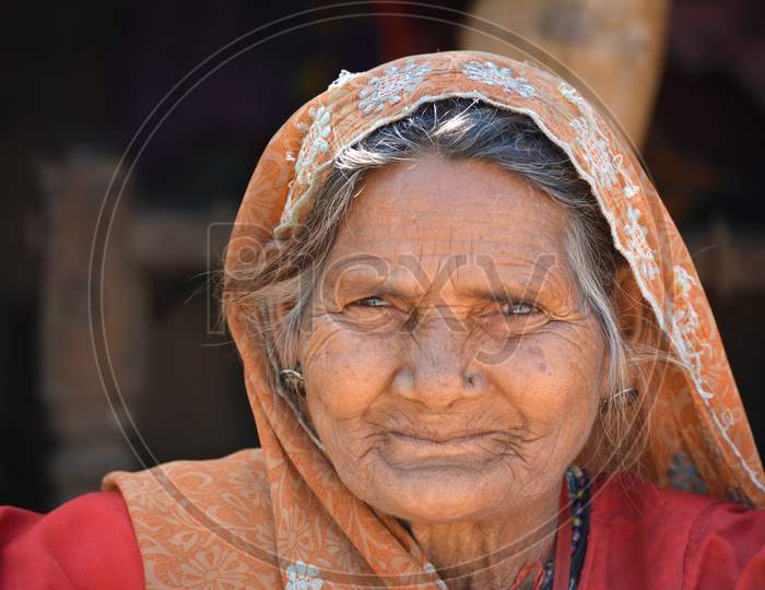 TIKAMGARH, MADHYA PRADESH, INDIA - FEBRUARY 03, 2020: Closeup portrait of an old indian woman at her village.