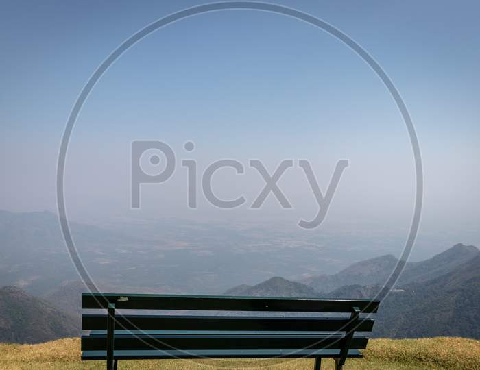 Isolated Sitting Bench With Amazing Landscape
