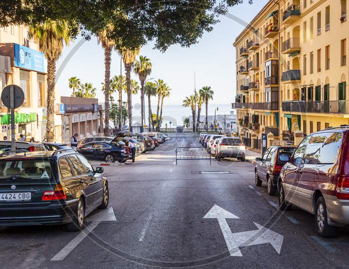 Malaga / Spain - May 18Th, 2020: Empty Street With Parked Cars, Sunny Day