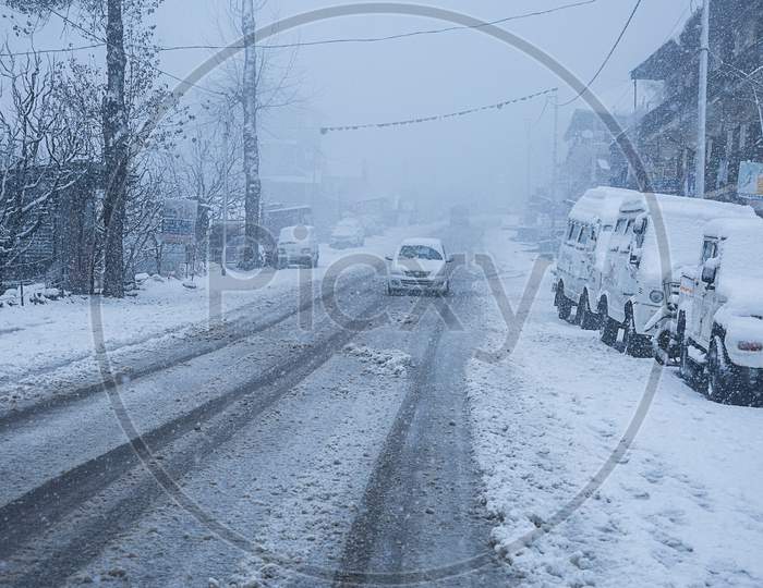 Manali, India - Jan 22, 2019: Trees, Road And Vehicle Covered With White Snow,. - Image