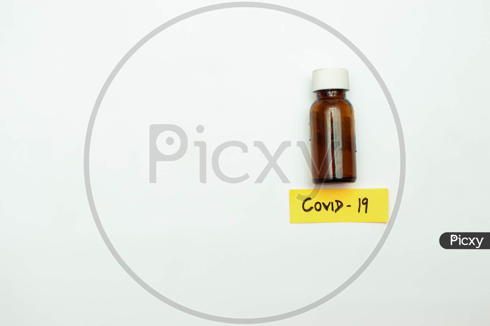 Corona virus vaccine in small brown bottle