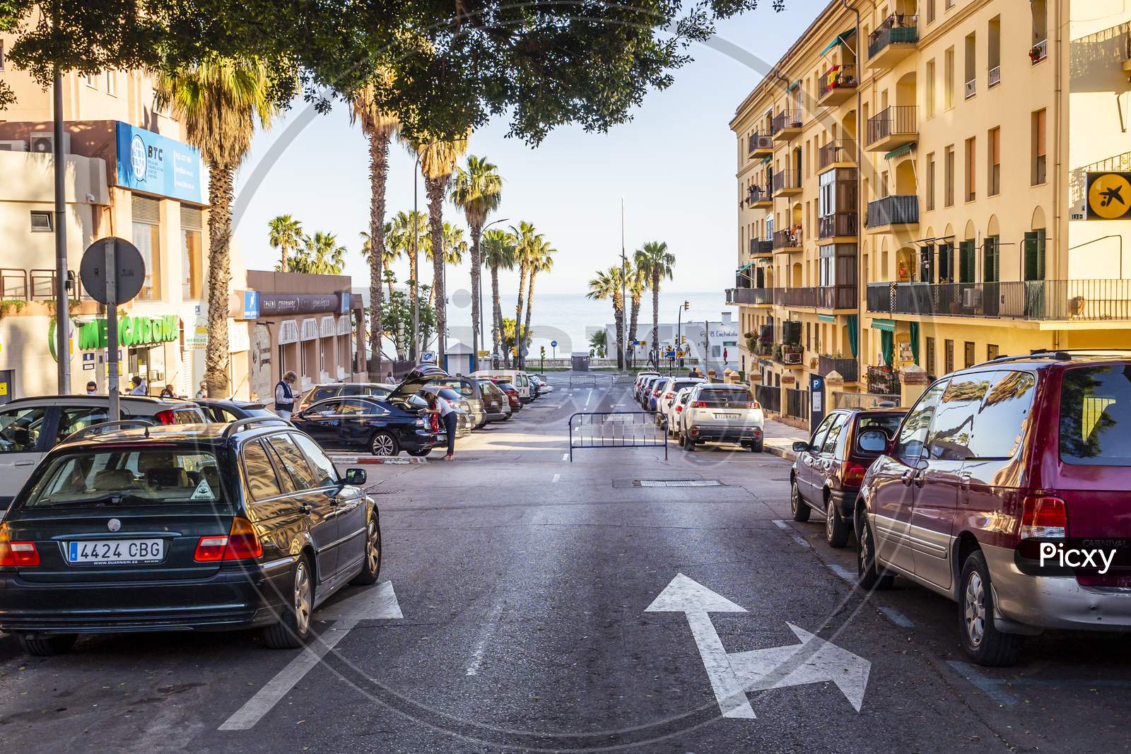 Malaga / Spain - May 18Th, 2020: Empty Street With Parked Cars, Sunny Day