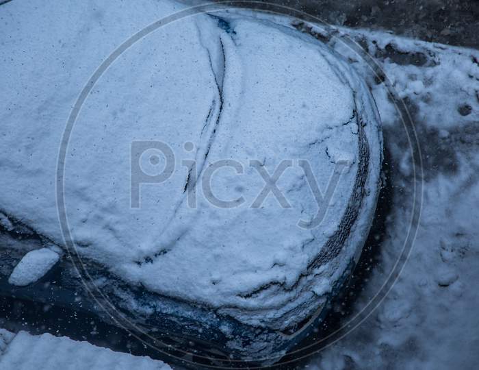 Car Covered With A Thick Layer Of Snow,Top Angle. Concept: Winter Weather And Car Owner Confrontation - Image