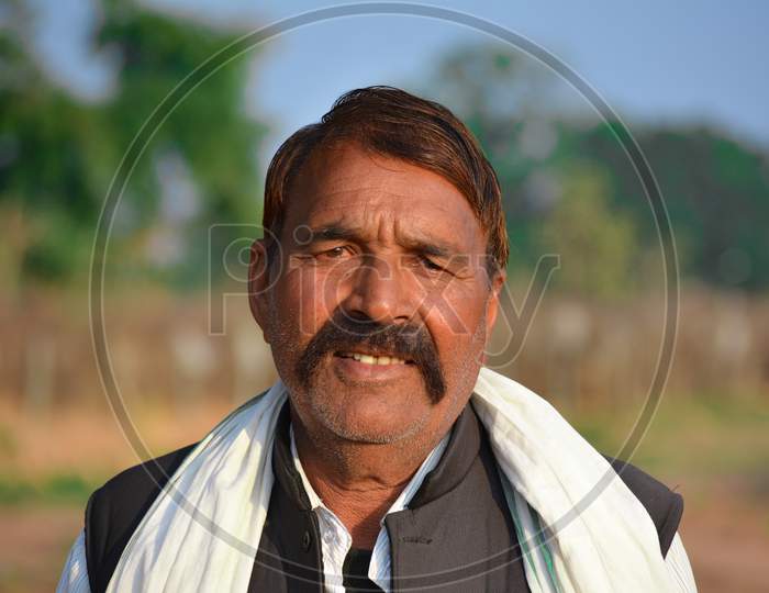 TIKAMGARH, MADHYA PRADESH, INDIA - FEBRUARY 08, 2020: A portrait of old unidentified indian man at his village.