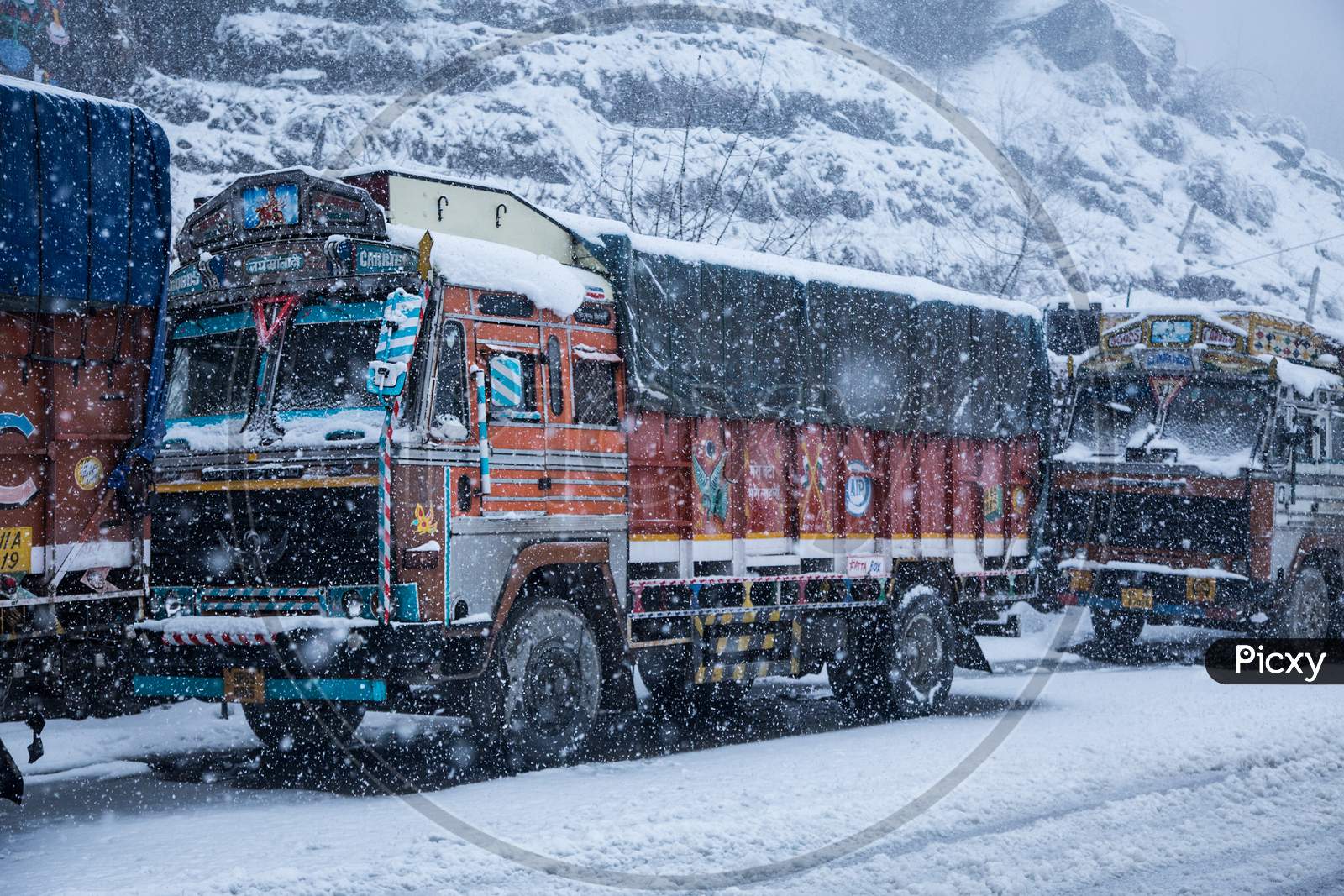 Manali, India - Jan 22, 2019: Trucks Parked On Roadside On Winter Snowy Day. - Image