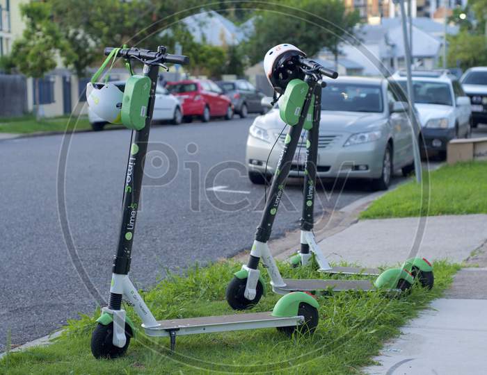 View Of Three Lime E-Scooters