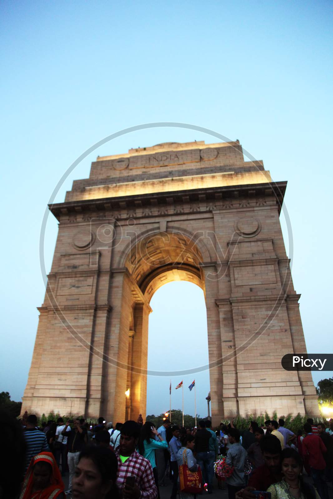 India Gate in New Delhi with Visitors in the Foreground