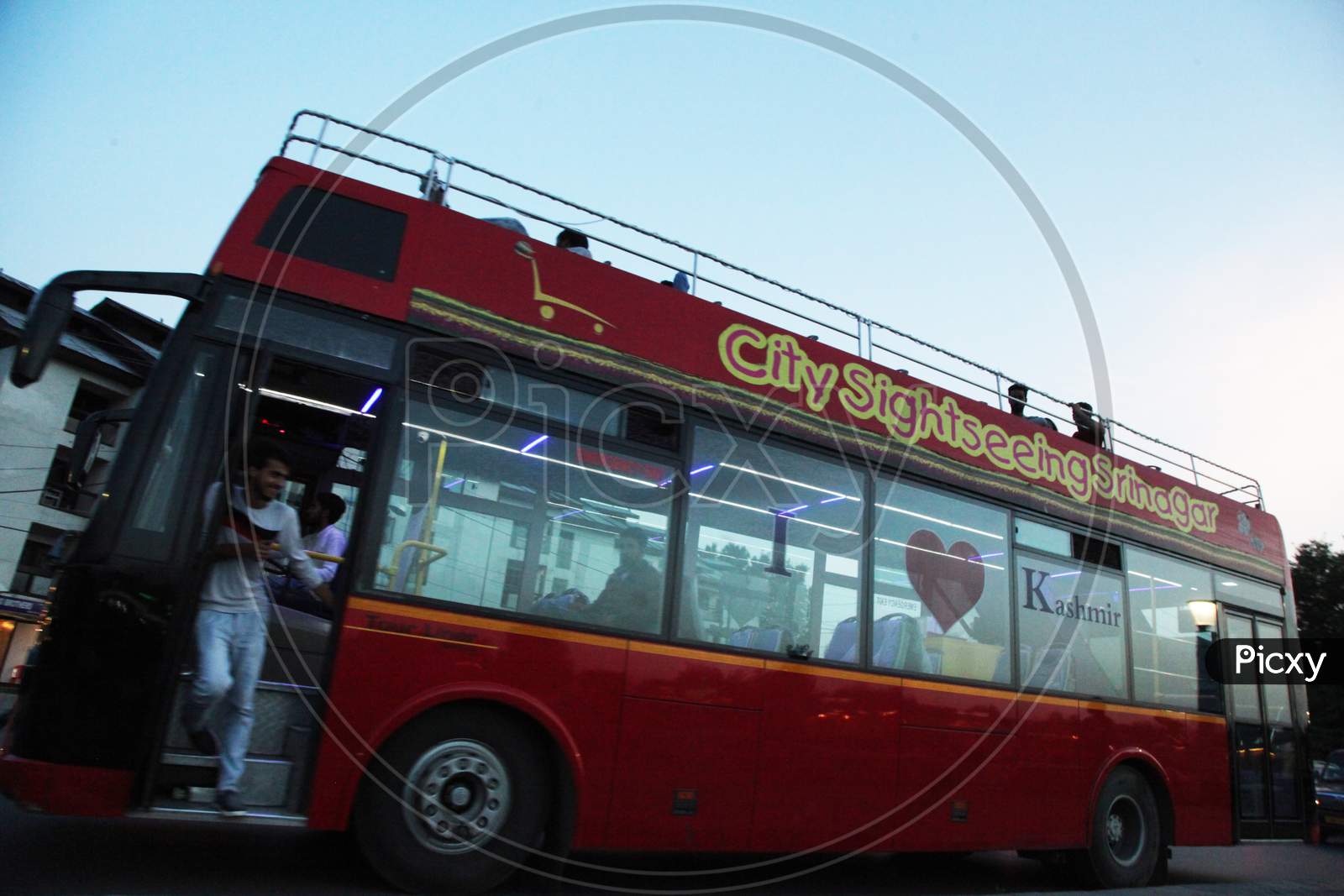 People moving in a double-decker bus in Kashmir