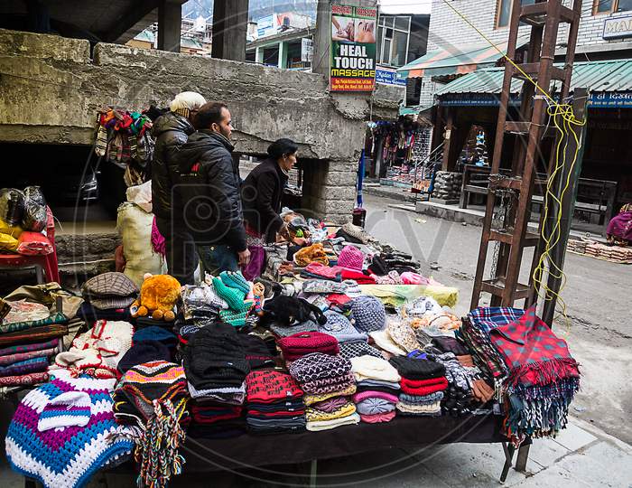 Manali , Himachal Pradsh, India - January 21, 2019 : Vendors Selling Woolen Clothes And Other Handmade Traditional Winters Products Near Mall Road, Manali Street Baazar Market - Image