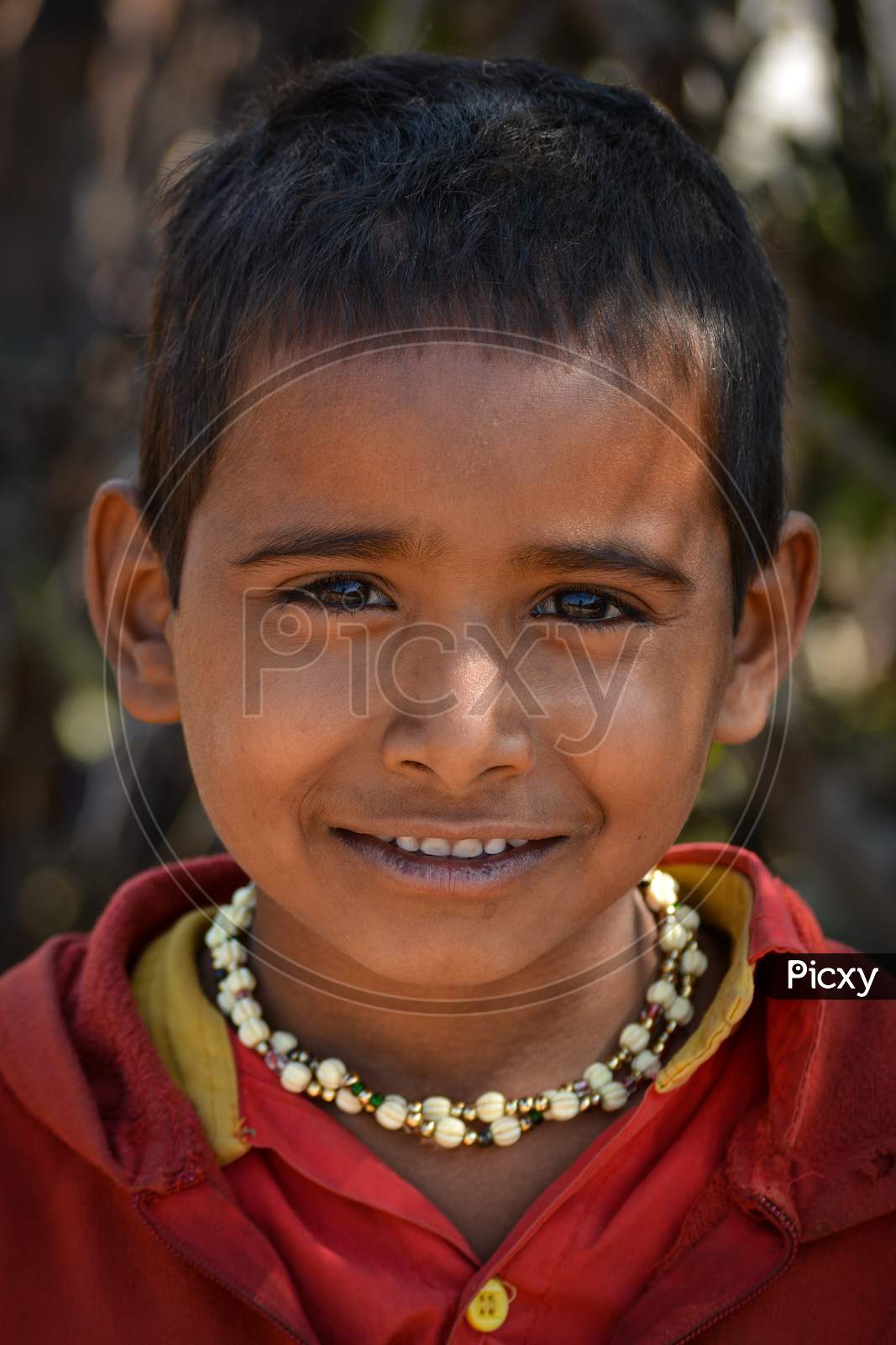 TIKAMGARH, MADHYA PRADESH, INDIA - FEBRUARY 03, 2020: Unidentified indian village boy staring at the camera.
