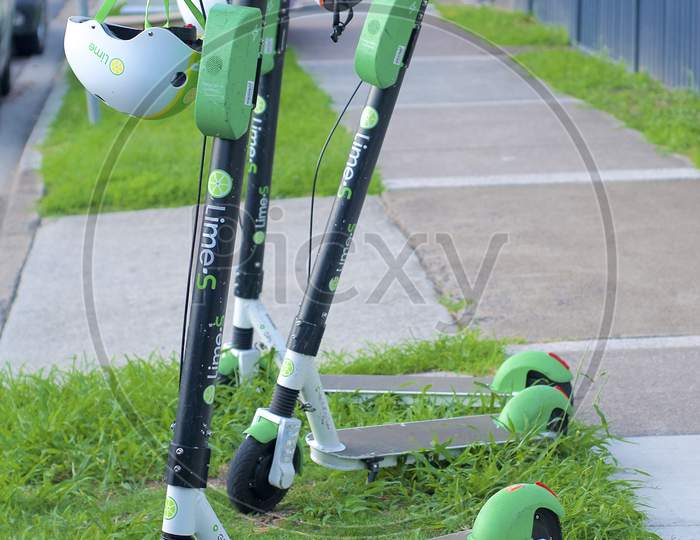 View Of Three Lime E-Scooters