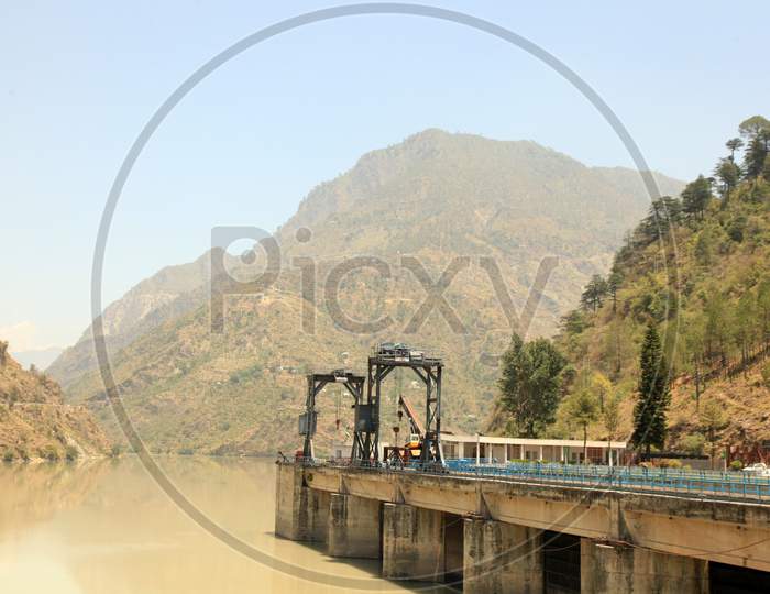 Mountains of Himachal Pradesh with Waterflow and bridge in the foreground