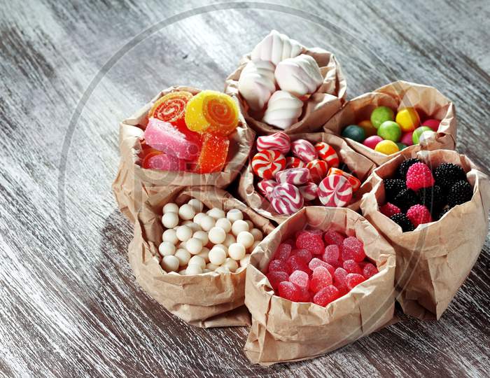 Collection of Multiple types of colorful sweet sugar candies for birthday of kids