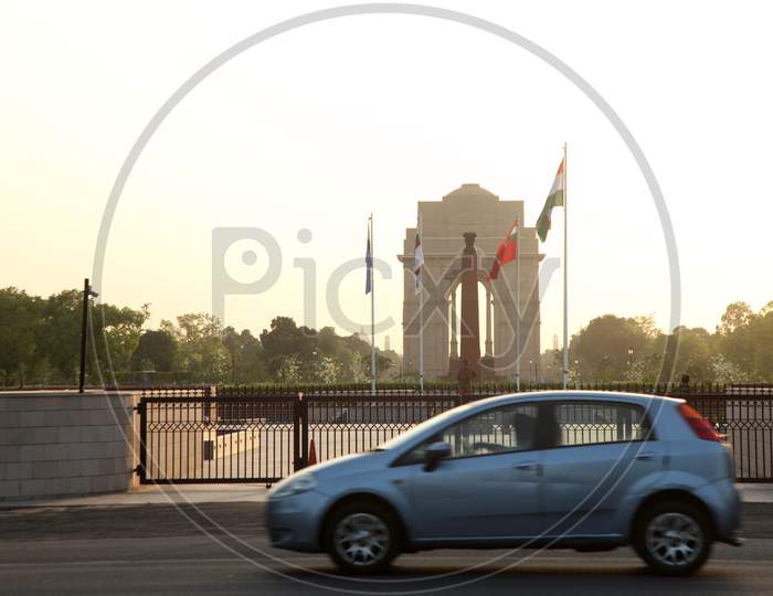 India Gate in New Delhi with Vehicles moving the foreground