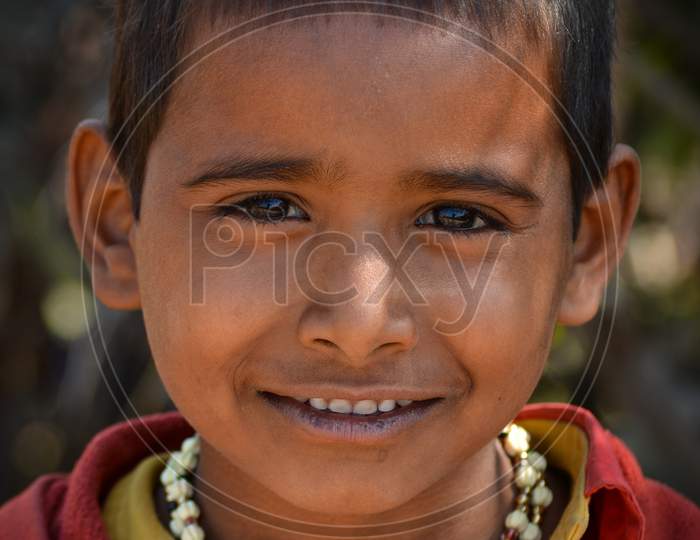 TIKAMGARH, MADHYA PRADESH, INDIA - FEBRUARY 03, 2020: Unidentified indian village boy staring at the camera.