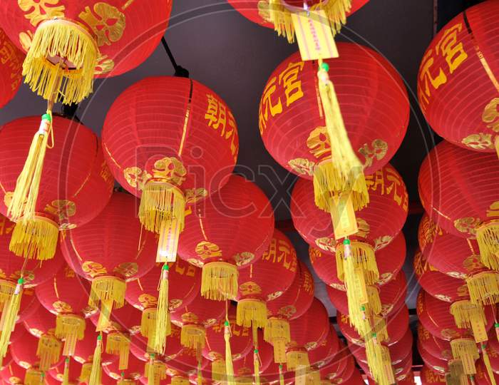 Close Up Picture Of A Large Group Of Chinese Paper Lanterns Hanging From A Ceiling In George Town - Penang