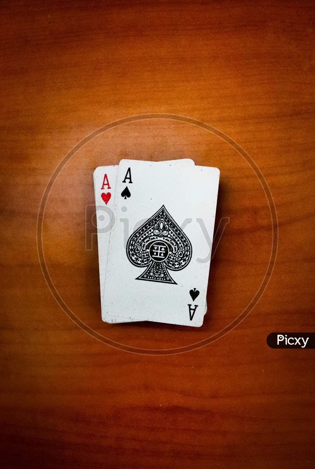 Playing card deck on wooden table